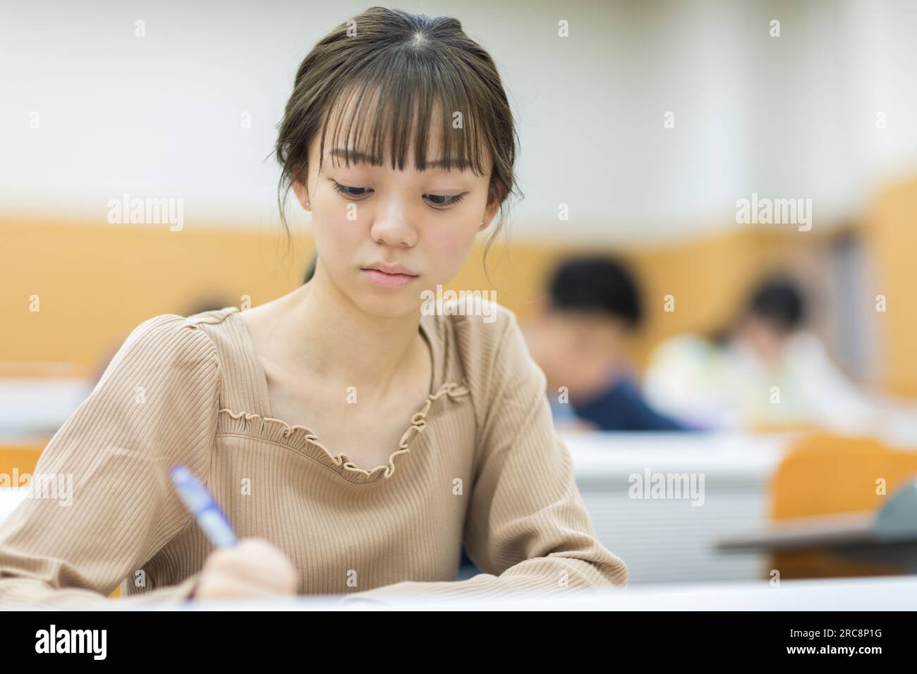 University students receiving a lecture Stock Photo - Alamy
