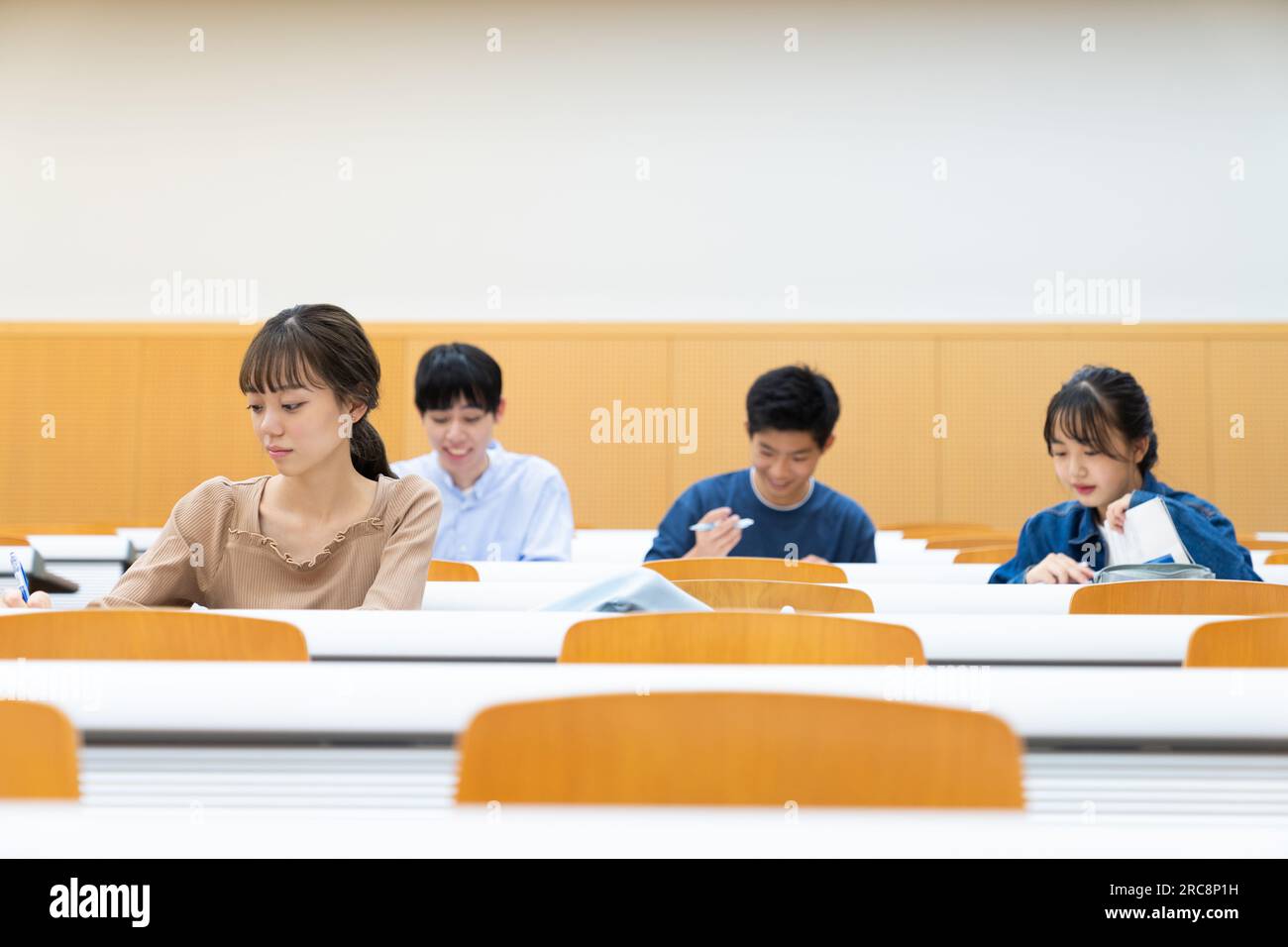 University students receiving a lecture Stock Photo - Alamy