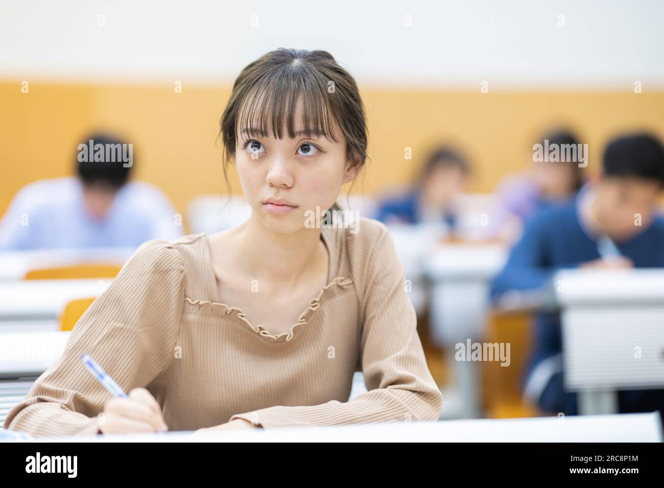 University students receiving a lecture Stock Photo - Alamy