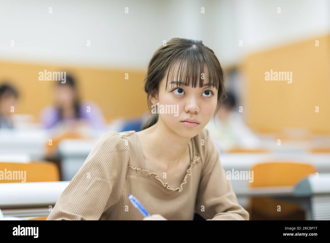 University students receiving a lecture Stock Photo - Alamy
