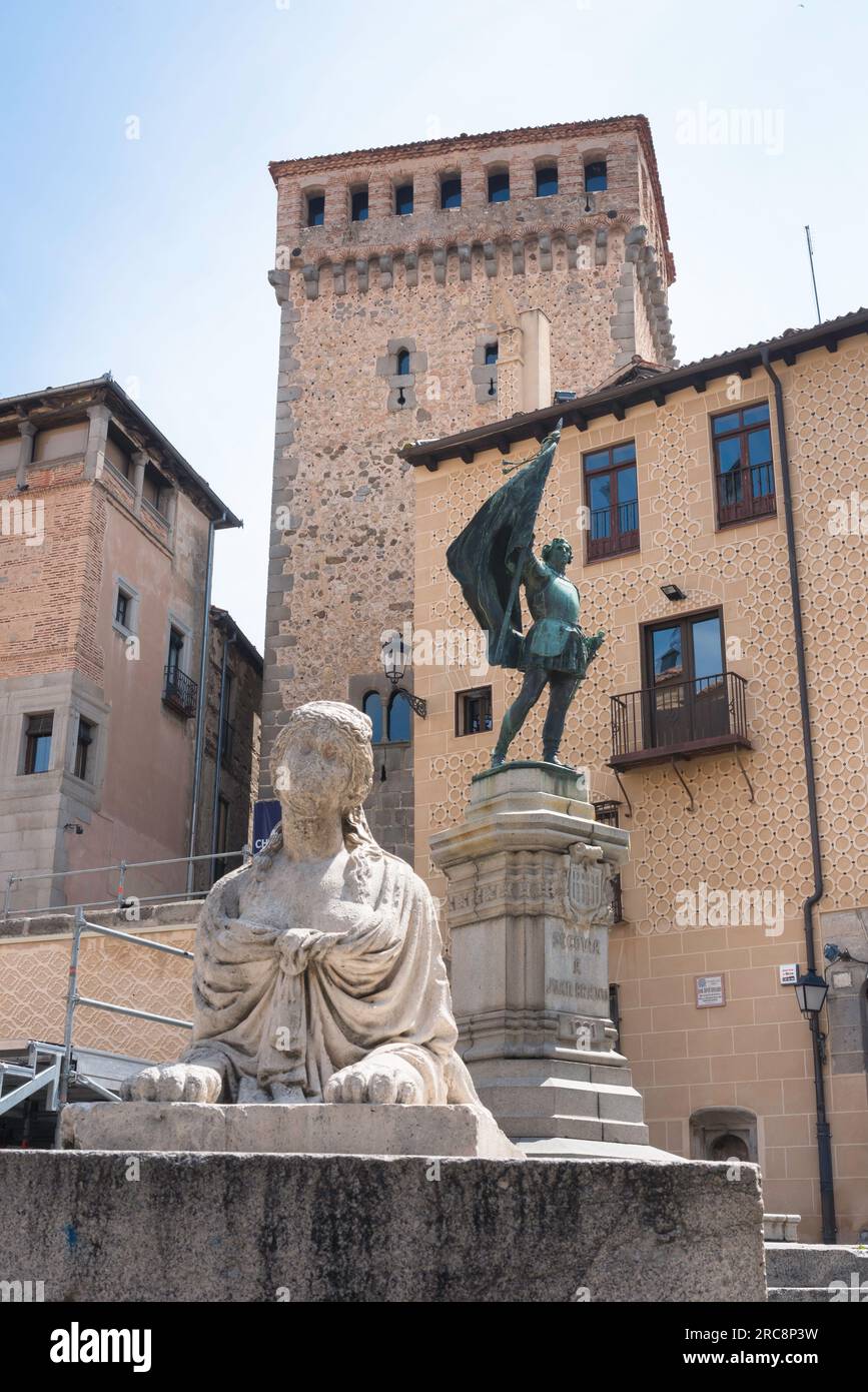 View of the statues of the Sirenas de Segovia and 16th Century folk hero Juan Bravo sited in the Plaza de San Martin in the city of Segovia, Spain Stock Photo