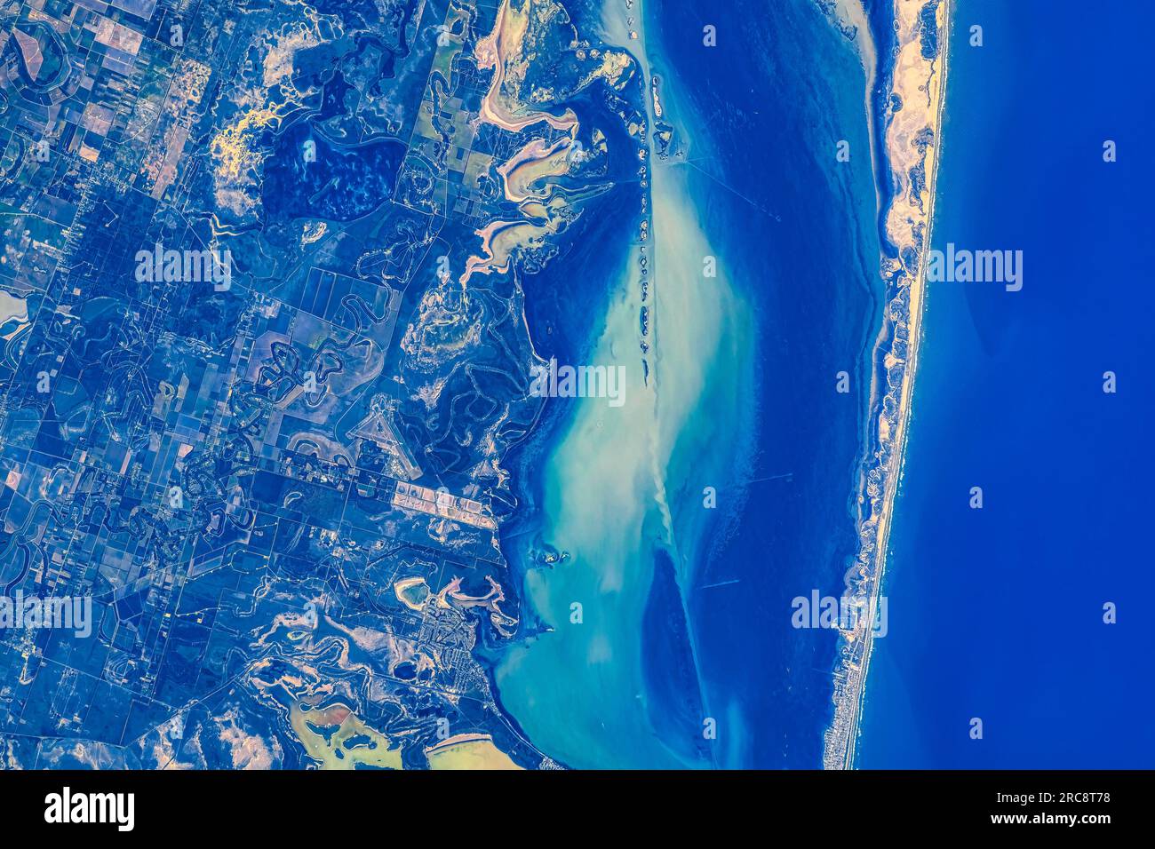 Coastal feature of the South Padre Island, USA. Image by NASA. Media usage guidelines: https://www.nasa.gov/multimedia/guidelines/index.html Stock Photo