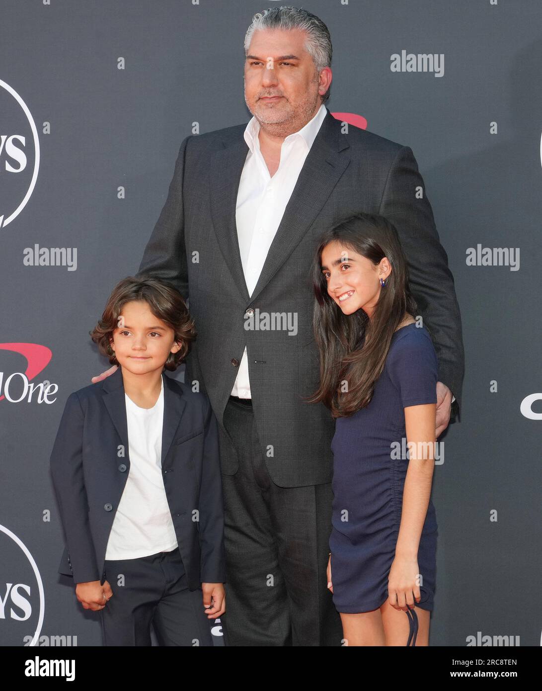 Los Angeles, USA. 12th July, 2023. Nick Khan and Kids arrives at The Los Angeles, USA. 12th July, 2023. Nick Khan and Kids arrives at The