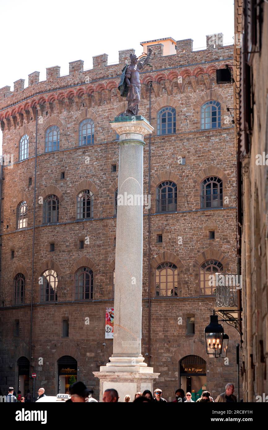 Florence, Italy - April 5, 2022: Column of Justice is an ancient Roman marble column with a porphyry statue of Justice at the top. Stock Photo