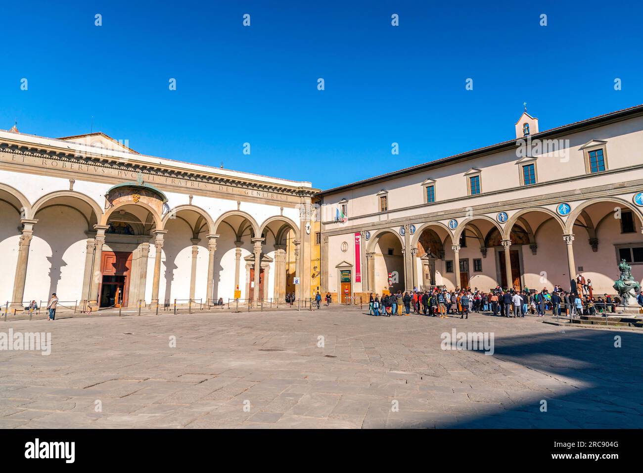 Florence, Italy - April 5, 2022: The Santissima Anunziata Square hosts SS Annunziata Basilica, Hospital of the Innocents and a statue of Ferdinand I o Stock Photo