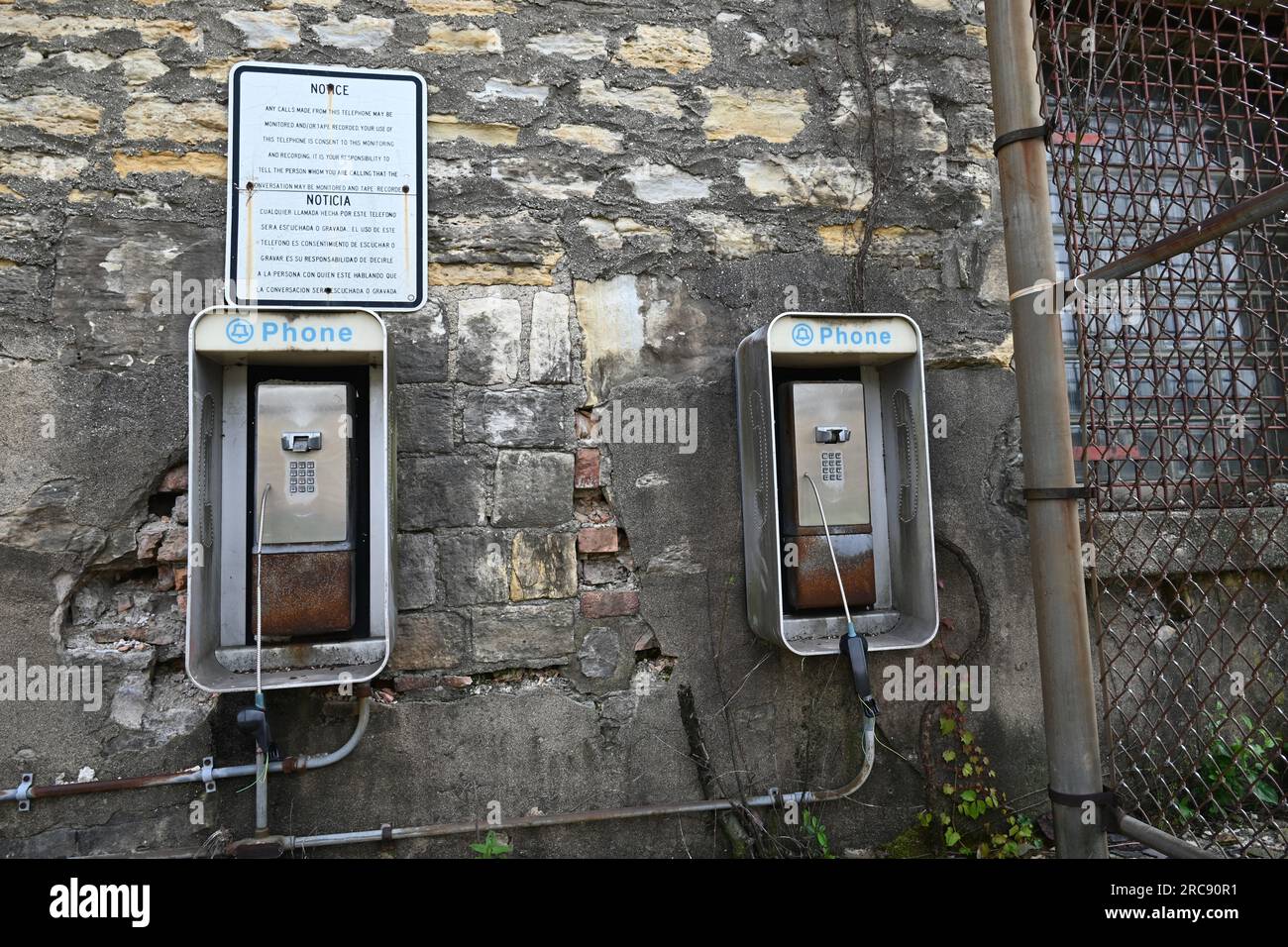 Remains of old inmate payphones in the yard at the Old Joliet Prison, which opened in 1858 and was closed and abandon in 2002. Stock Photo