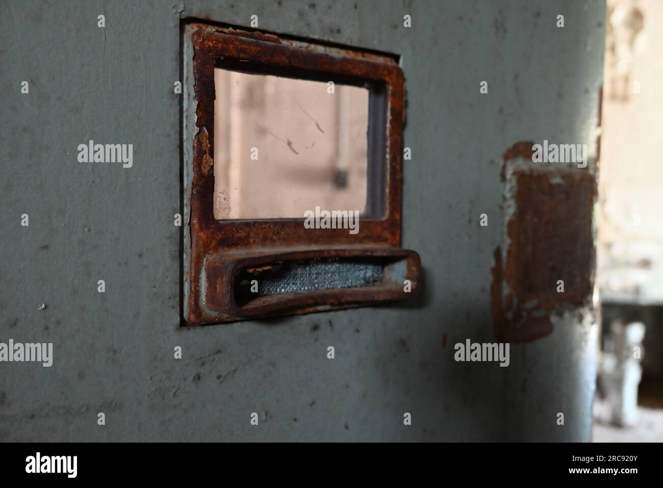 One of the isolation cell door prisoner windows at the Old Joliet Prison, which was opened in 1858 and closed in 2002. Stock Photo