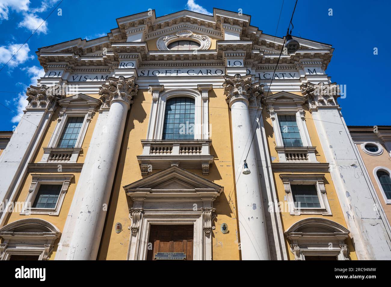 Façade of Basilica dei Santi Ambrogio e Carlo al Corso on Via del Corso in Rome, Lazio Region, Italy Stock Photo