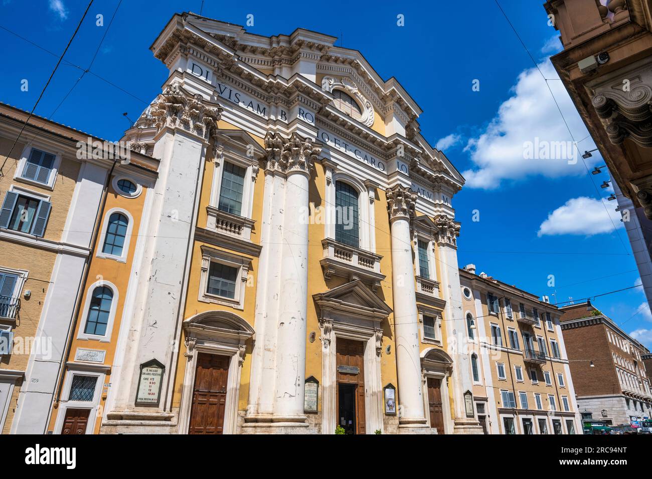 Façade of Basilica dei Santi Ambrogio e Carlo al Corso on Via del Corso in Rome, Lazio Region, Italy Stock Photo