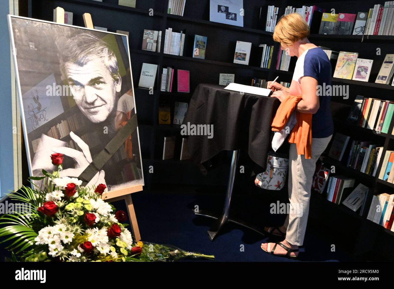 Brno, Czech Republic. 13th July, 2023. Book of condolences and portrait at the memorial site commemorating the late writer Milan Kundera at the Milan Kundera Library, part of the Moravian Library (MZK) in Brno, Czech Republic. Czech-born writer Milan Kundera, living in France since 1975, has died at the age of 94 years. Credit: Vaclav Salek/CTK Photo/Alamy Live News Stock Photo