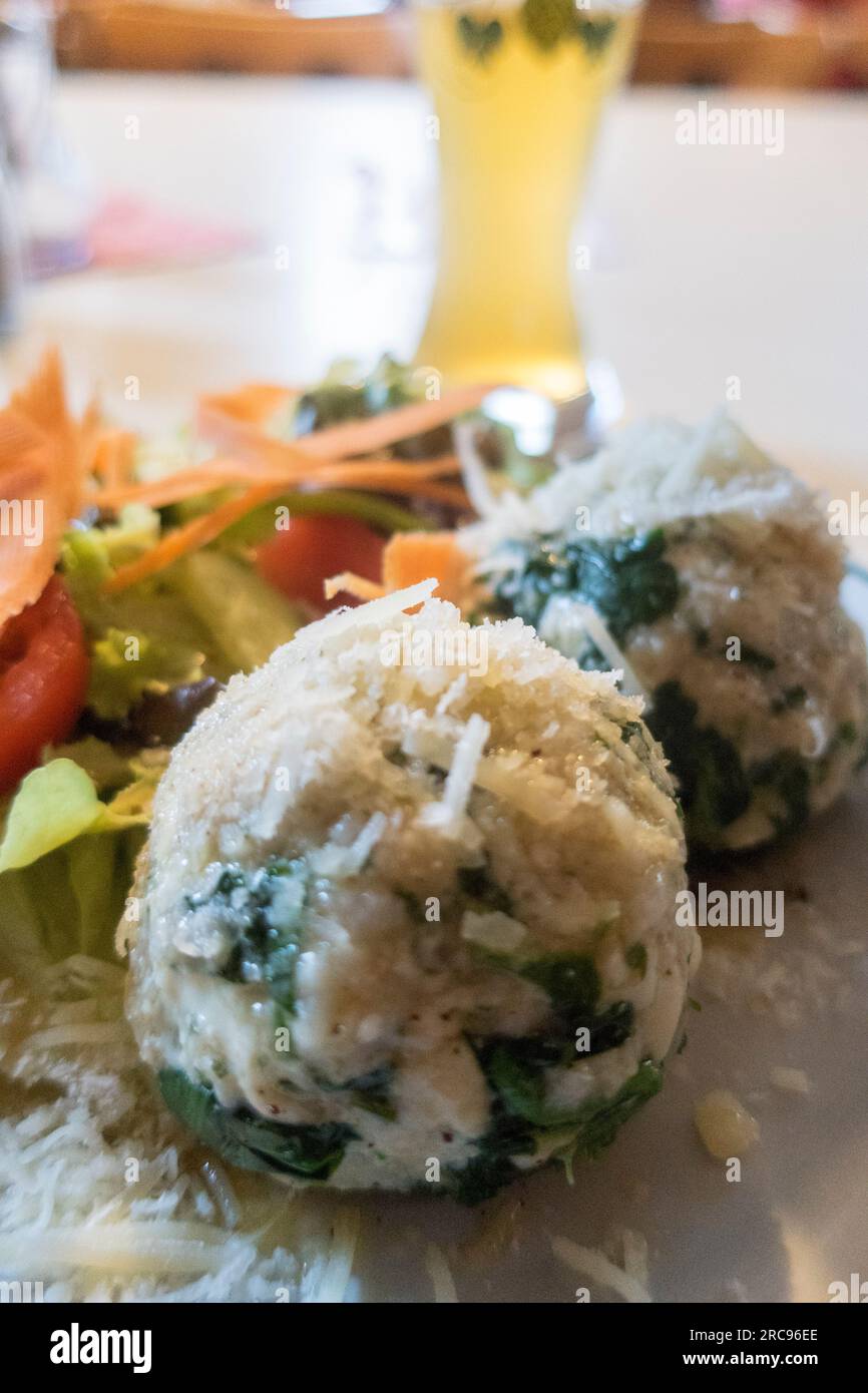 spinat dumplings with mixed salad Stock Photo