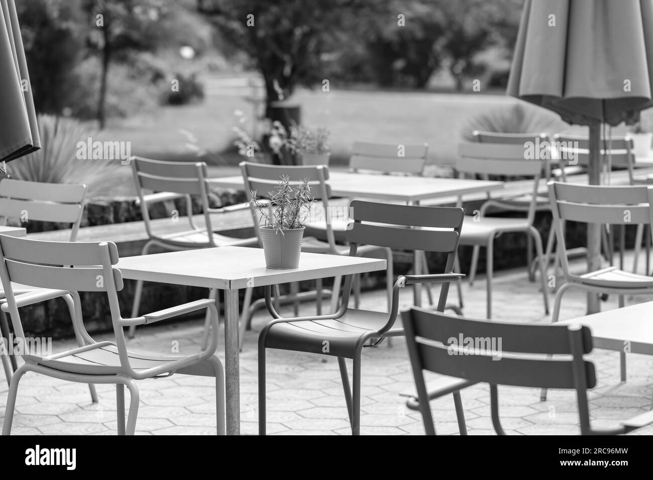 View of chairs and tables at an outdoor restaurant in Bonn Germany Stock Photo