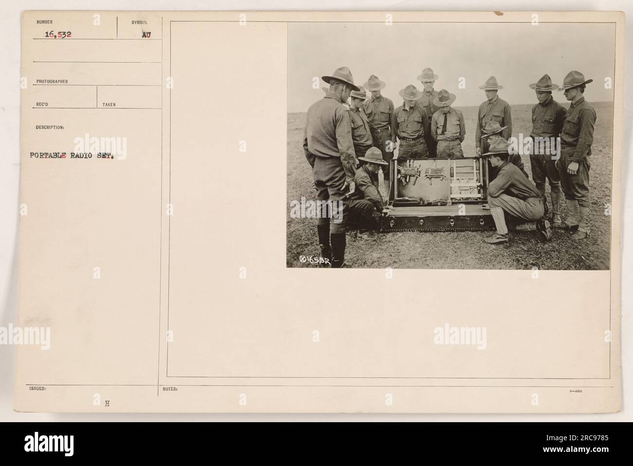 Soldier using a portable radio set during World War One. Portable