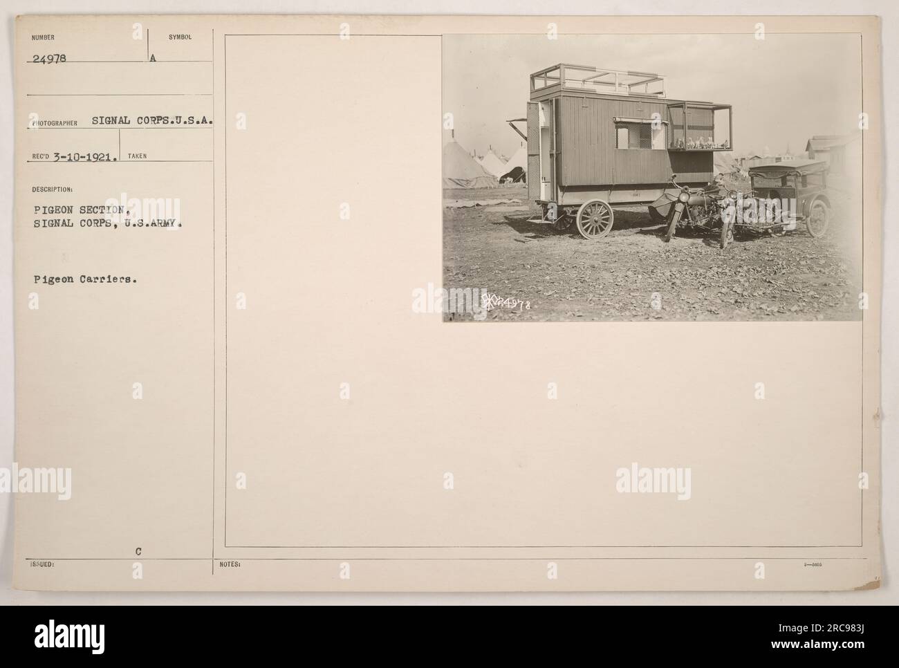 Image showing the Pigeon Section of the Signal Corps, U.S. Army during World War One. Pigeon carriers were used for communication purposes. The symbol issued for this section was C, and the photo was recorded on March 10, 1921. Stock Photo
