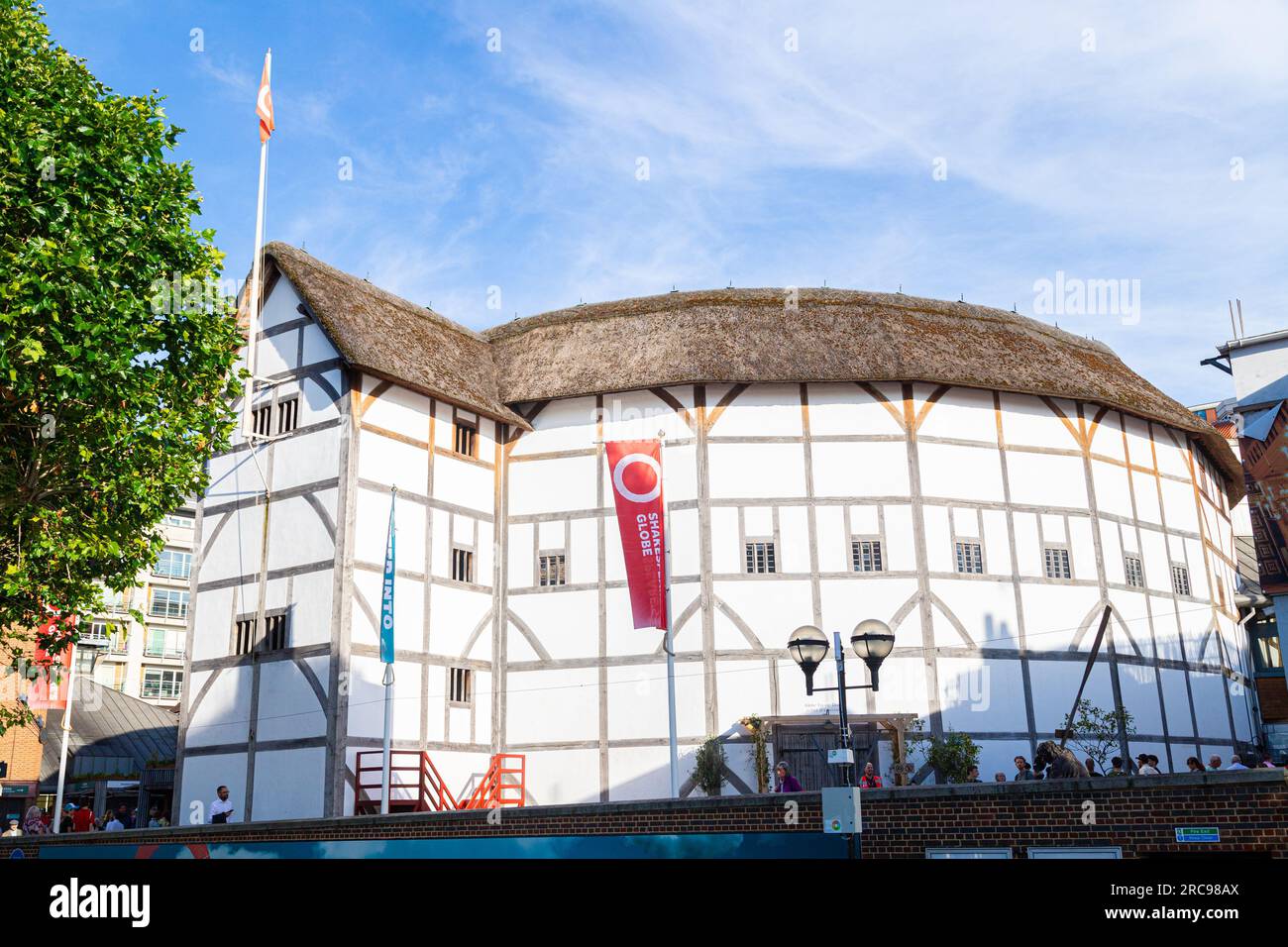 LONDON, UK - 6TH JULY 2023: Part of the Shakespeare's Globe theatre in central London. People can be seen. Stock Photo