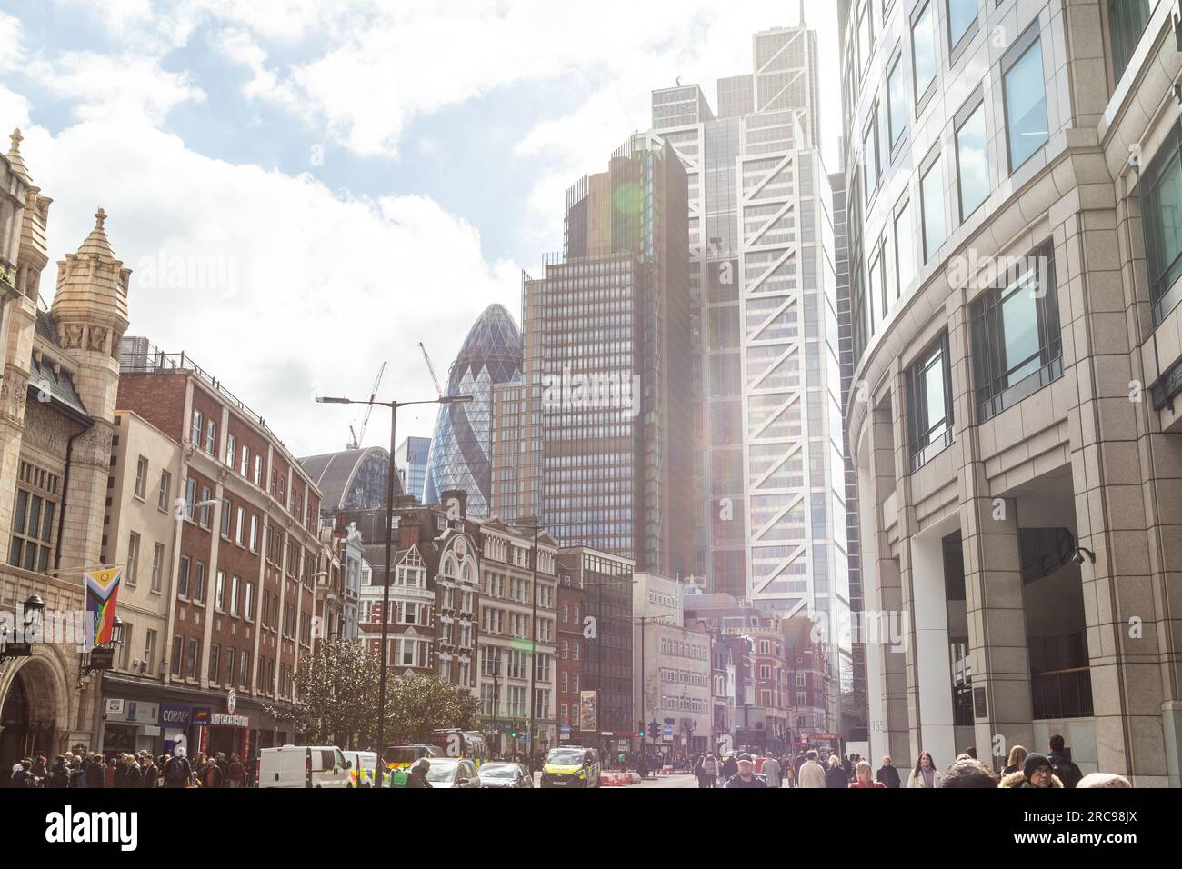 LONDON, UK - 2ND APRIL 2023: Buildings and offices in the business district at the City of London. People. can be seen on the streets. Stock Photo