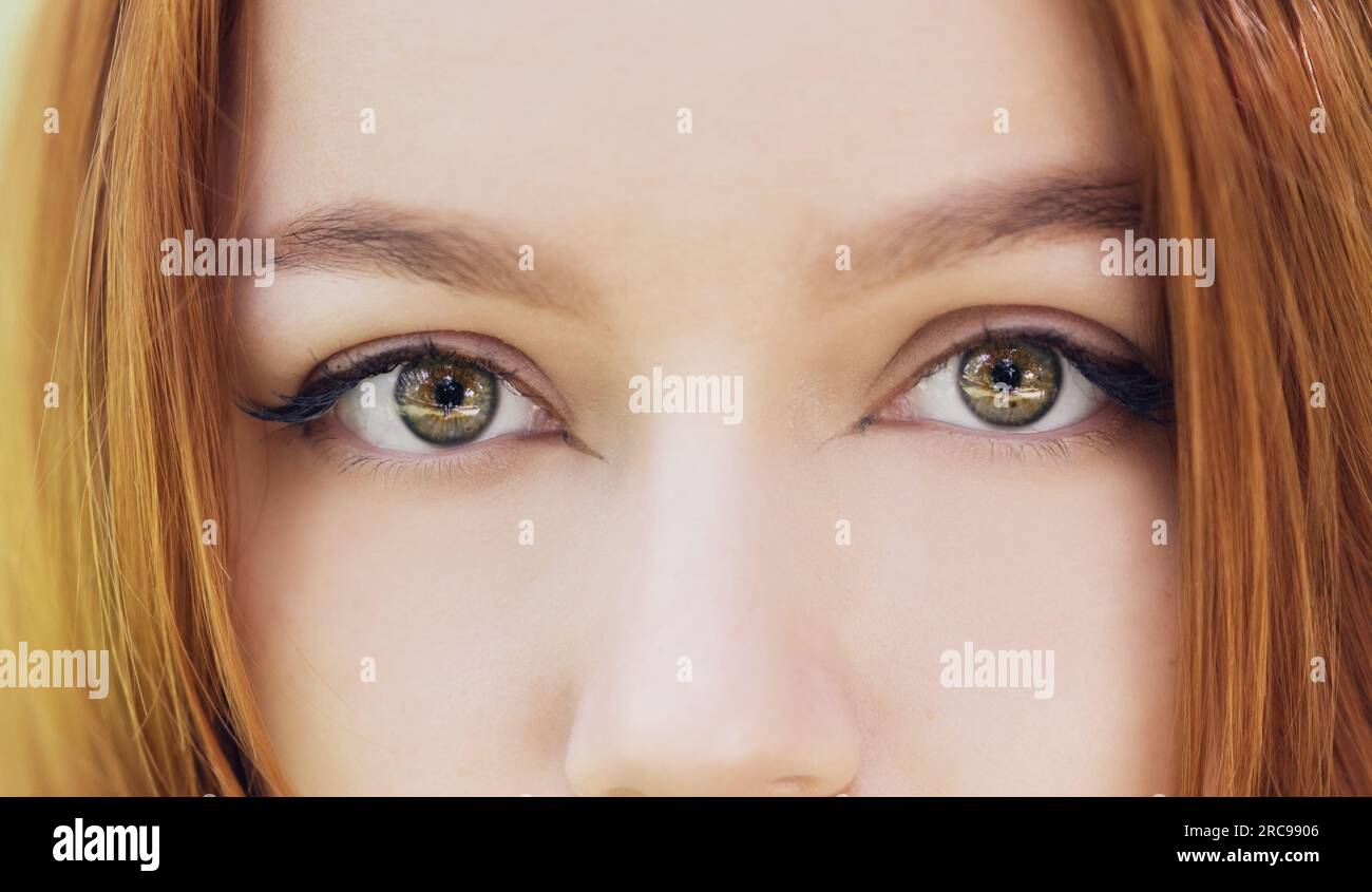 Portrait of beautiful young woman with red hair Stock Photo - Alamy