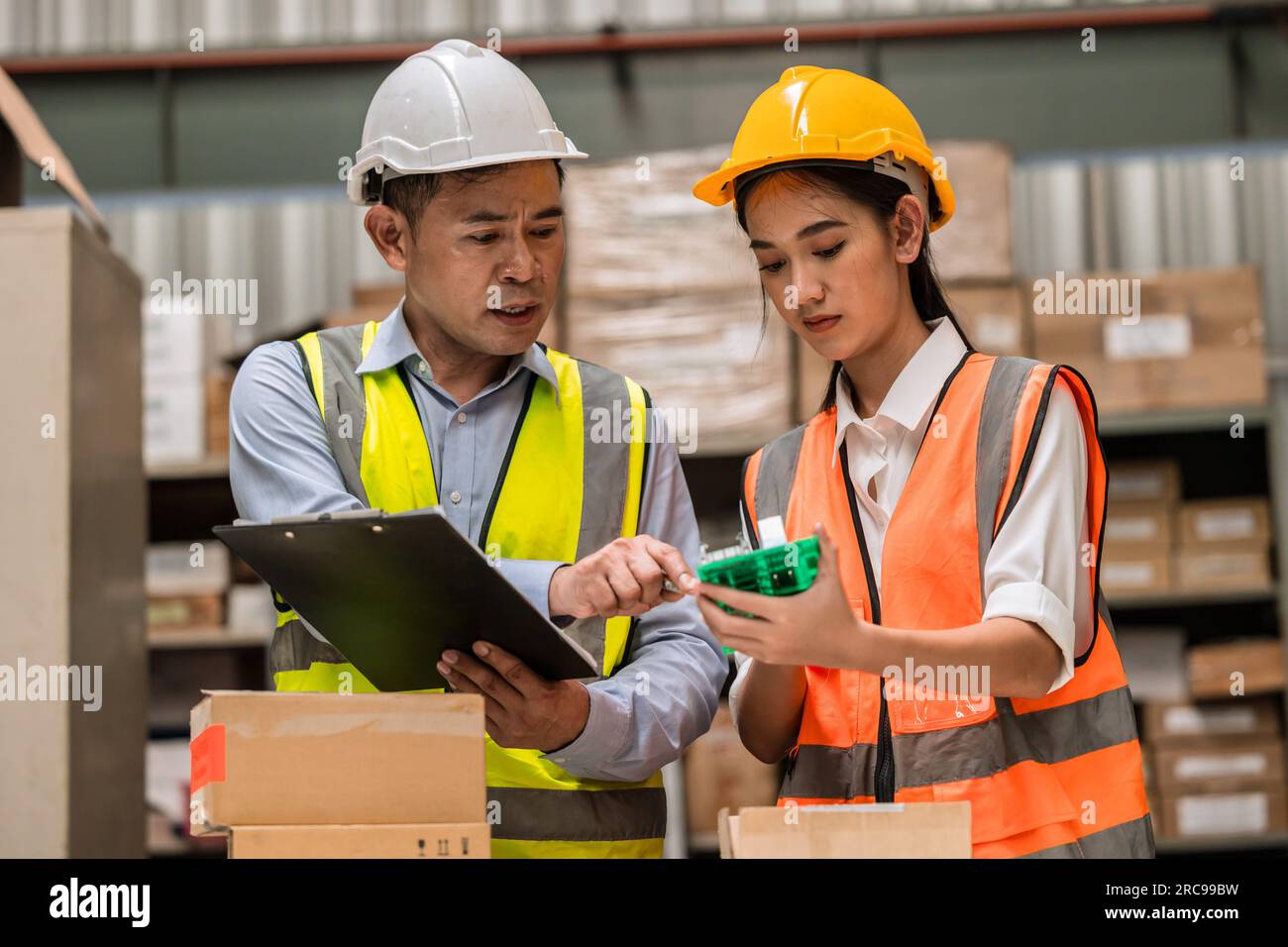 senior engineer manager supervisor working training young woman