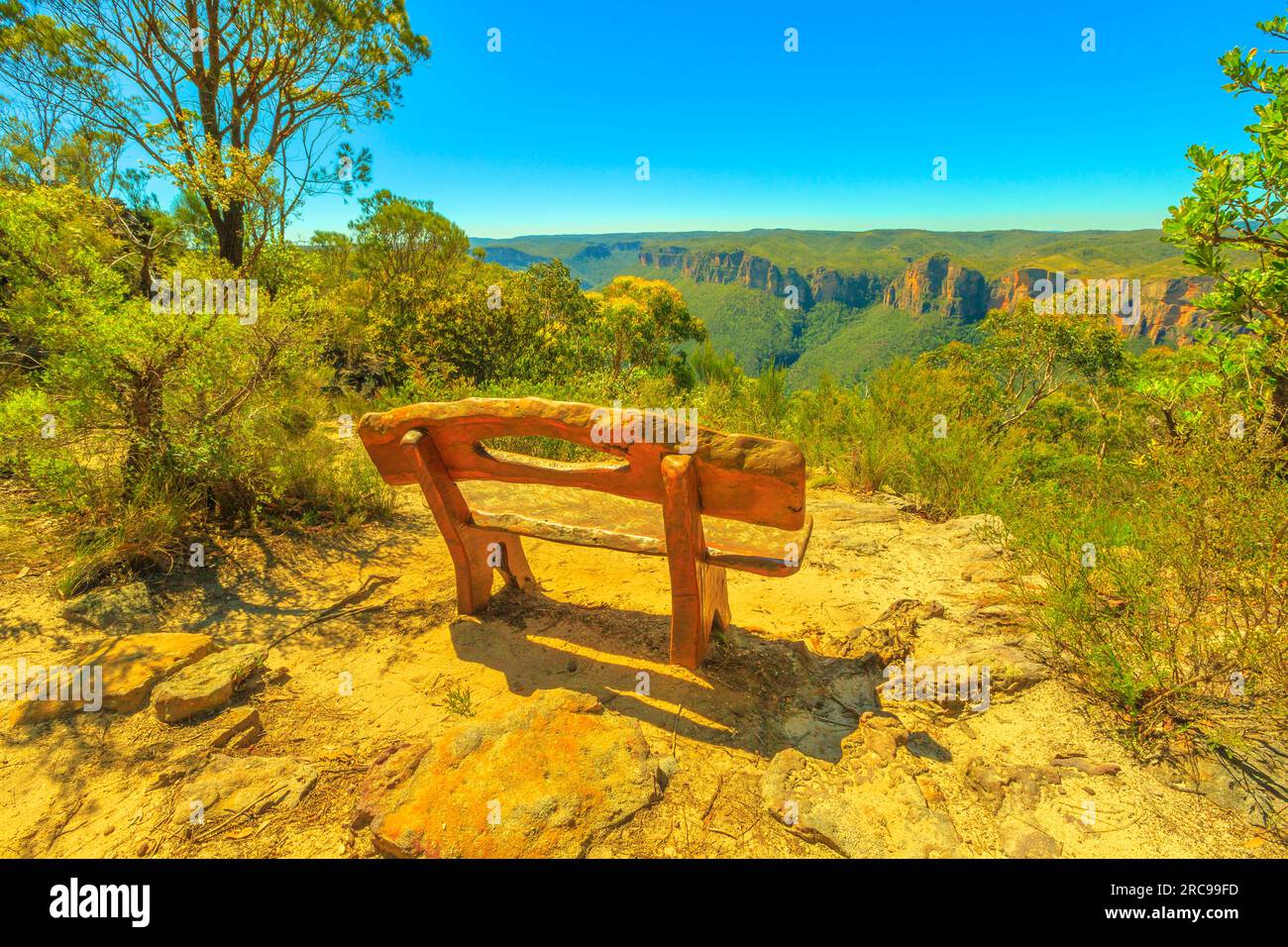 Rustic wooden bench along Anvil Rock Trail near Blackheath in Blue