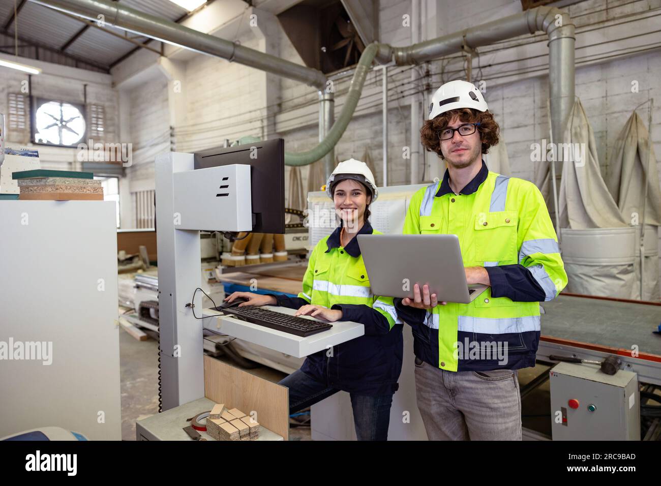 portrait young man and women engineer worker team work service support