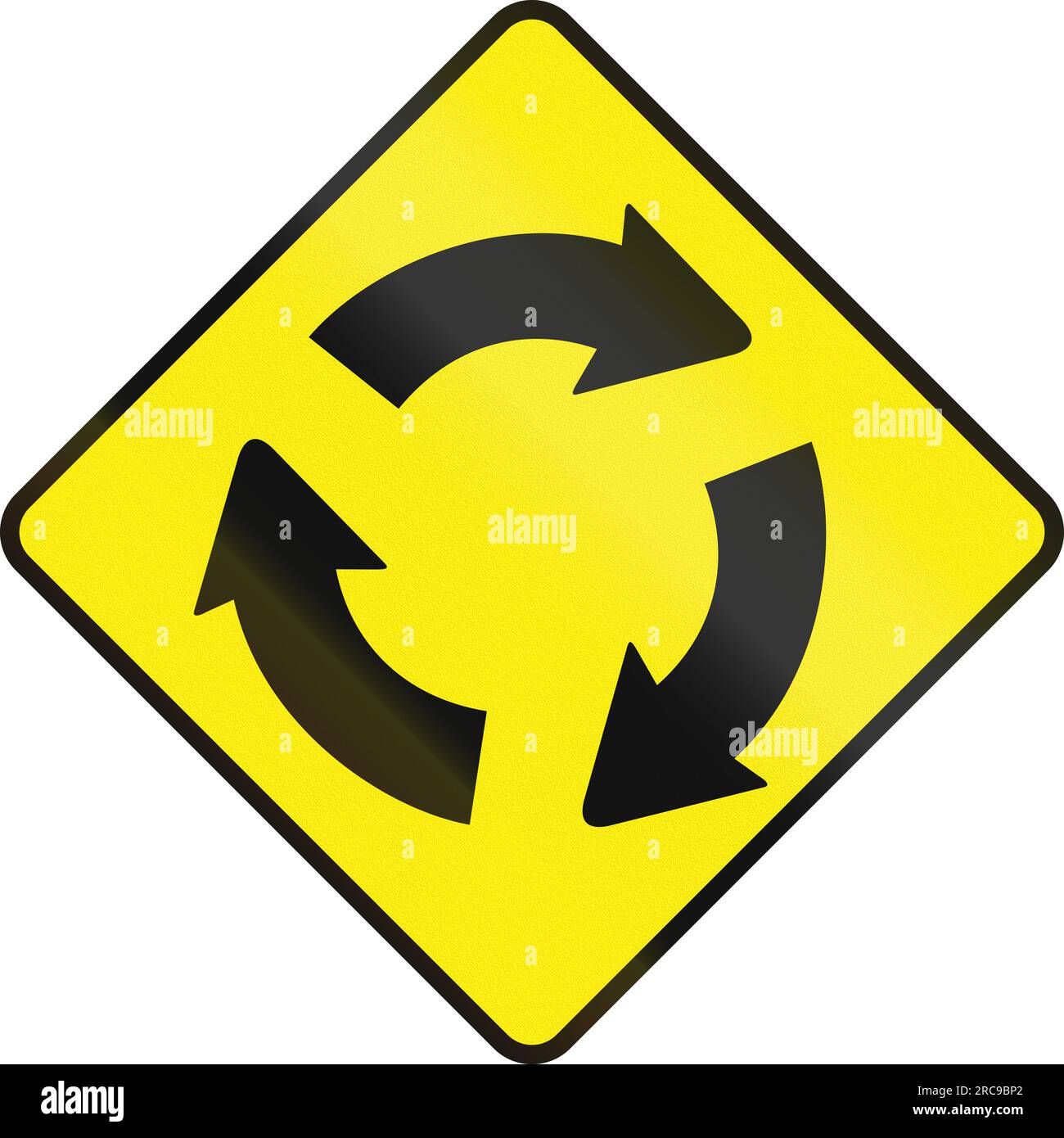 Irish road warning sign Traffic circle/roundabout ahead Stock Photo