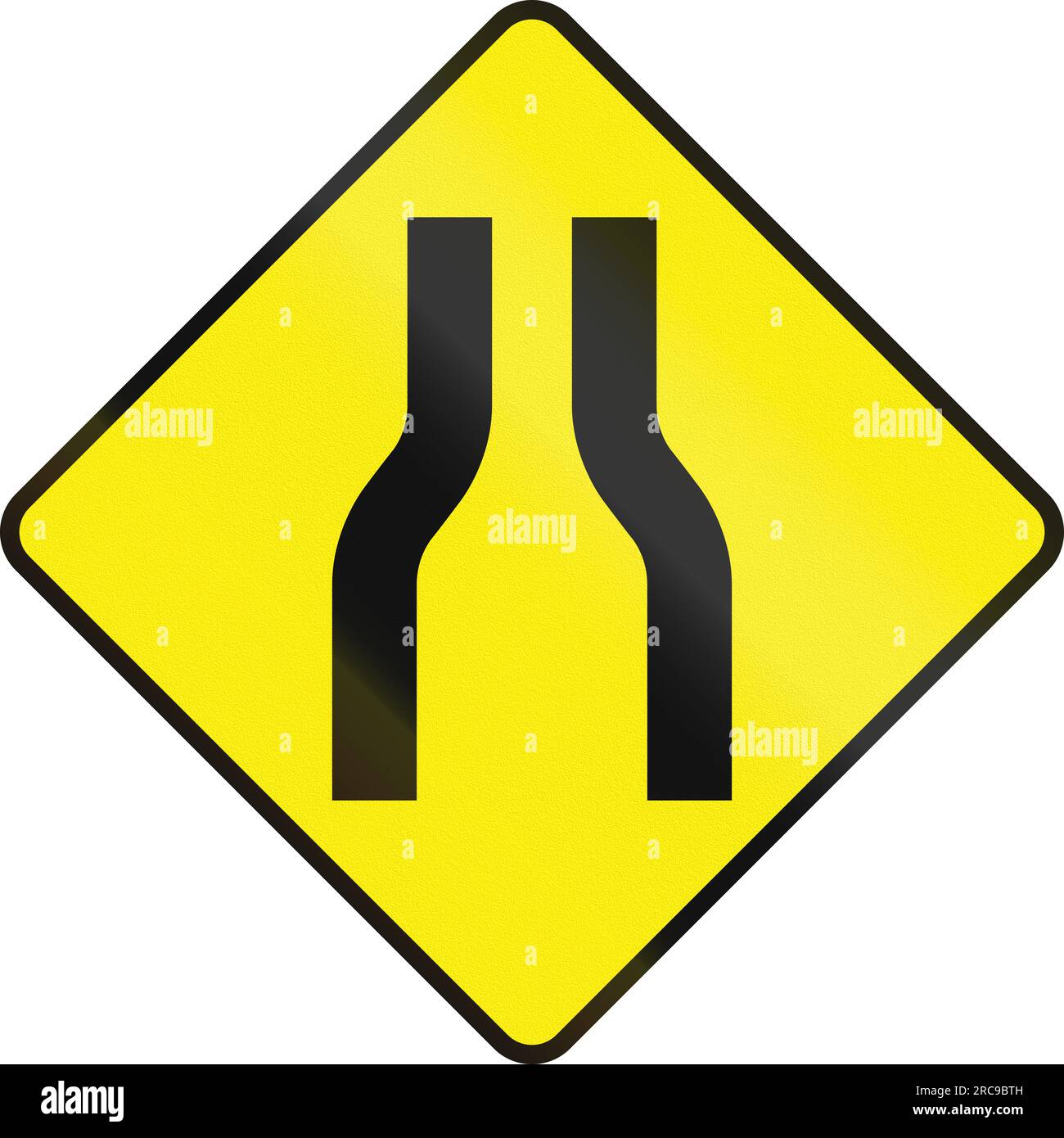 Irish road warning sign One lane road/narrow road ahead Stock Photo