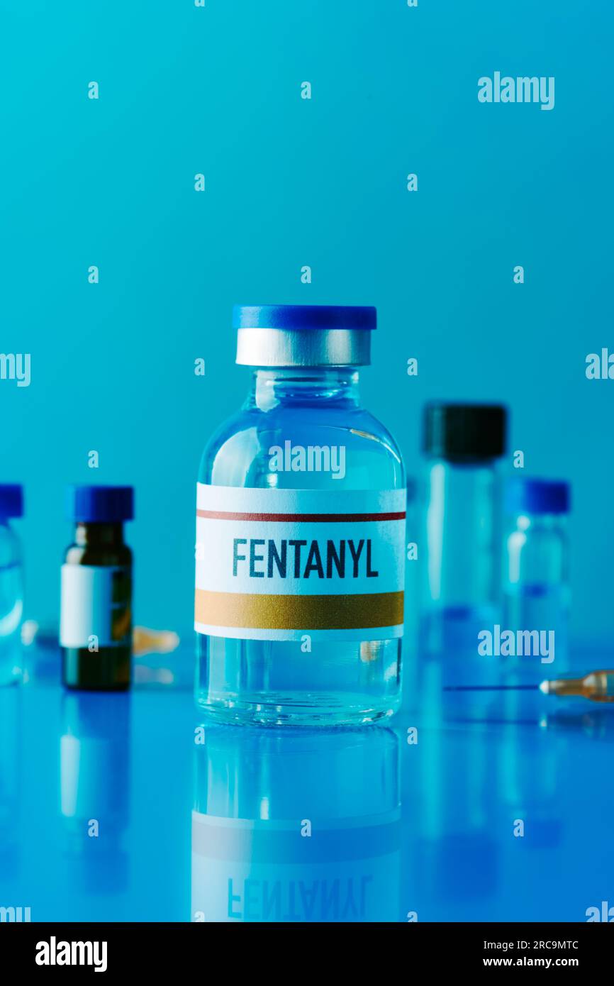 Fentanyl (fentanil) opioid analgesic drug, chemical structure. Conventional  skeletal formula and stylized representation, showing atoms (except  hydrogen) as color coded circles.