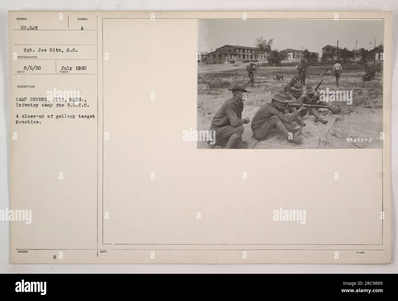 Caption: 'Camp Devens, Ayer, Mass. Infantry conducting R.O.T.C. training. A close-up image showing soldiers engaged in gallery target practice. Taken on August 2, 1920, by Sgt. Joe Hits, S.C. This photograph is part of the collection depicting American military activities during World War One.' Stock Photo