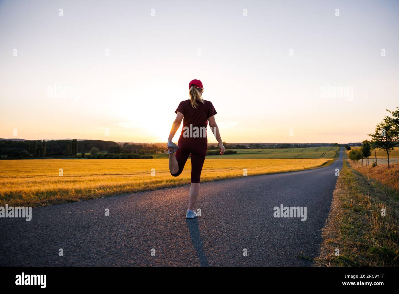 Woman fitness stretching legs hi-res stock photography and images - Alamy