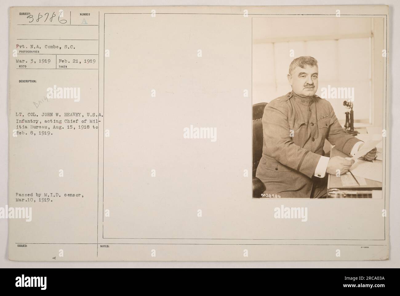 Pvt. N.A. Combe of S.C. takes a photograph of Lt. Col. John W. Heavey, U.S.A. Infantry, who served as the acting Chief of Militia Bureau from August 15, 1918 to February 8, 1919. The photo was taken on February 21, 1919, and received on March 3, 1919. It has been approved by the M.I.D. censor on March 10, 1919. Stock Photo