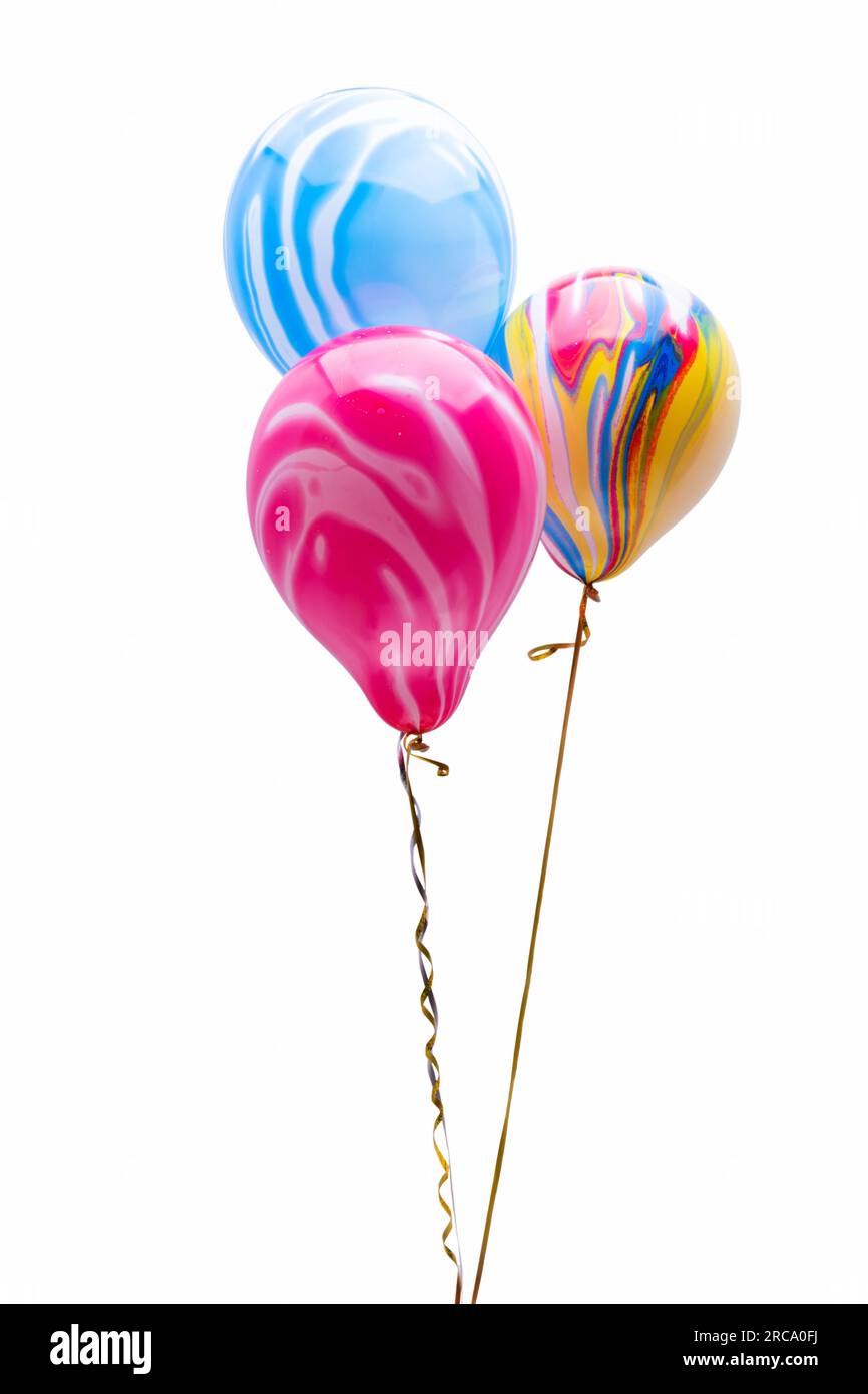 helium balloons isolated on white background Stock Photo - Alamy