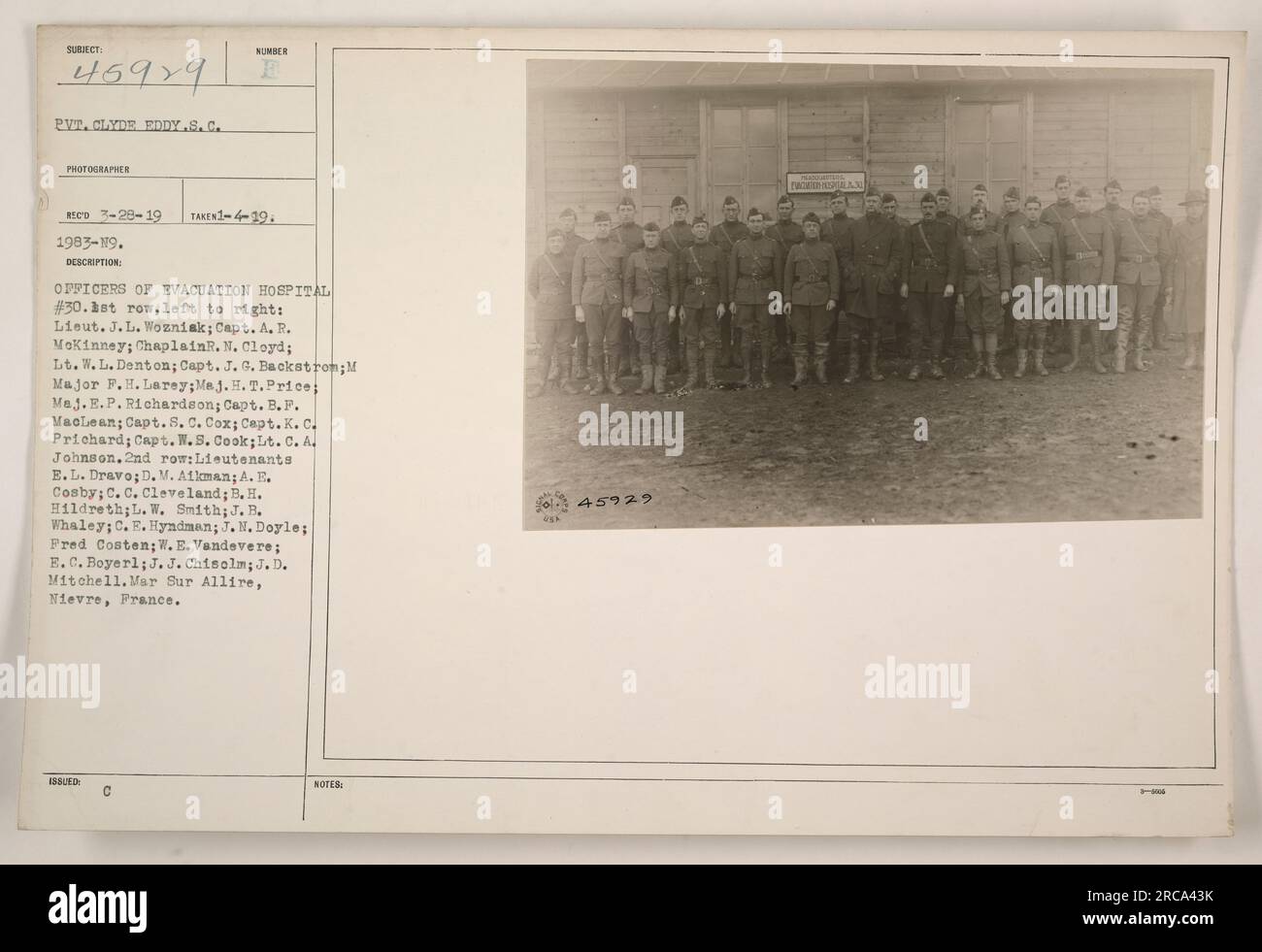 Officers of Evacuation Hospital #30. Front row, left to right: Lieut. J. L. Wozniak; Capt. A. R. McKinney; Chaplain R. N. Cloyd; Lt. W. L. Denton; Capt. J. G. Backstrom; Major F.H. Larey; Major H. T. Price; Major E. P. Richardson; Capt. B.F. MacLean; Capt. S. C. Cox; Capt. K. C. Prichard; Capt. W. S. Cook; Lt. C. A. Johnson. Second row: Lieutenants E.L. Dravo; D. M. Aikman; A. E. Cosby; C. C. Cleveland; B. H. Hildreth; L. W. Smith; J. B. Whaley; C. E. Hyndman; J. M. Doyle; Fred Costen; W. E. Vandevere; E.C. Boyer; J. J. Chisolm; J. D. Mitchell. Location: Mar Sur Allire, Nievre, France. Stock Photo