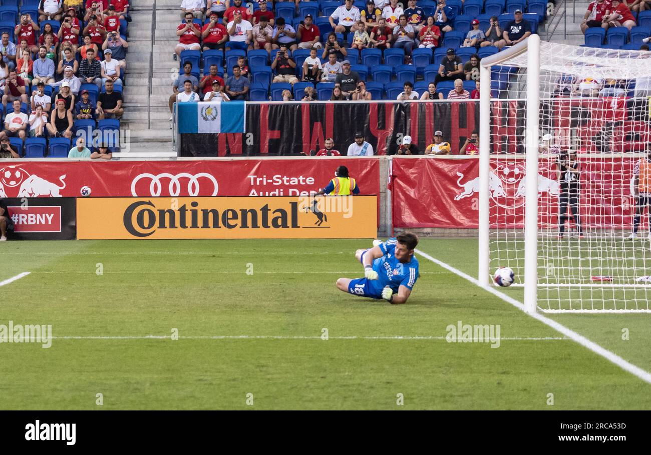 Goalkeeper Roman Celentano (18) of Cincinnati FC allowed goal by Omir Fernandez of Red Bulls (not pictured) from penalty kick during game at Red Bull Arena in Harrison on July 12, 2023 Stock Photo