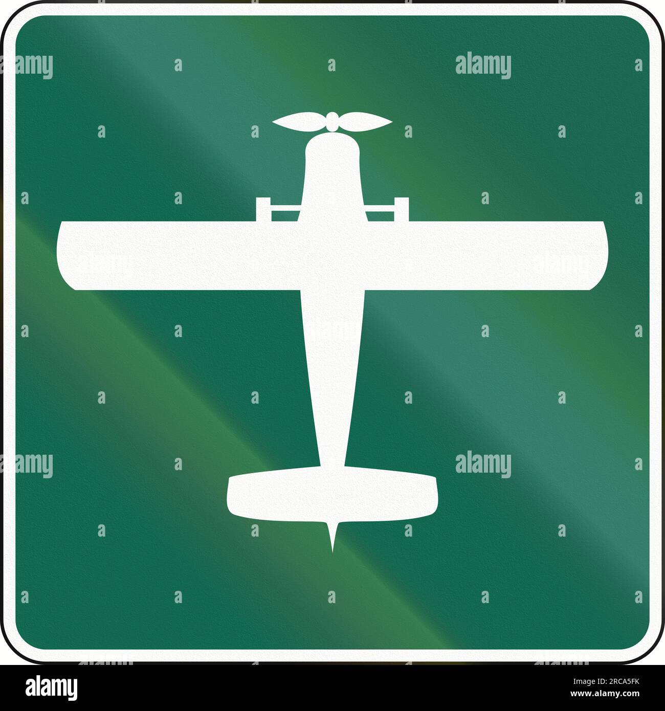 Local airport road guide sign in Canada. This sign is used in Ontario ...