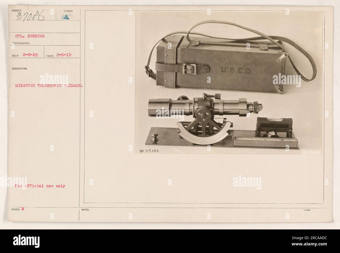 Cpl. Newberg photographed using a miniature telescopic alidade on February 5, 1919. The image was recorded as subject 37086 and was part of the official documentation of American military activities during World War One. Stock Photo