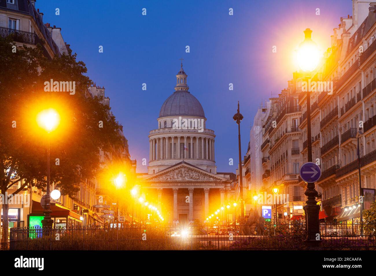 View of the Pantheon building in Paris at sunset time with the street