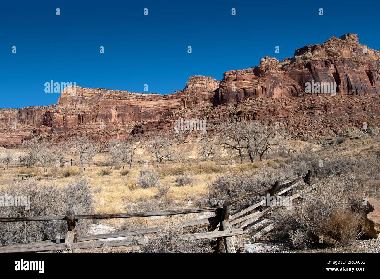 Split rail fence and red rocks. Stock Photo