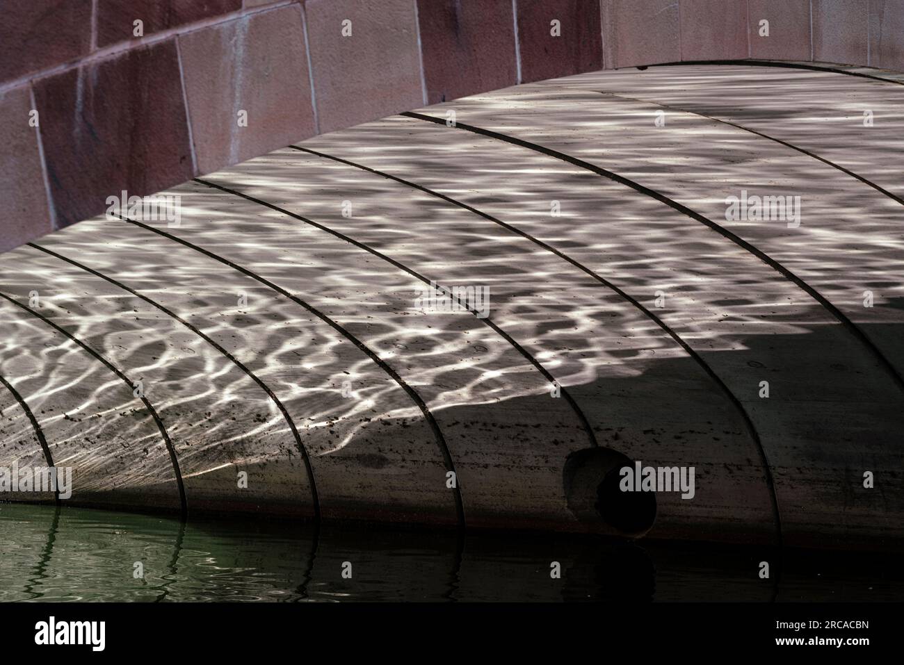 Reflections under bridge in Mueller Lake Park, Austin, Texas Stock Photo