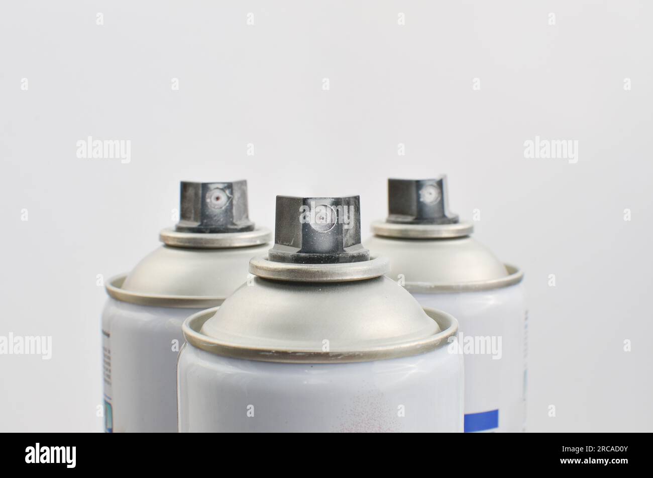 Detail of sprays of whitelabeled paint, representing art in motion and