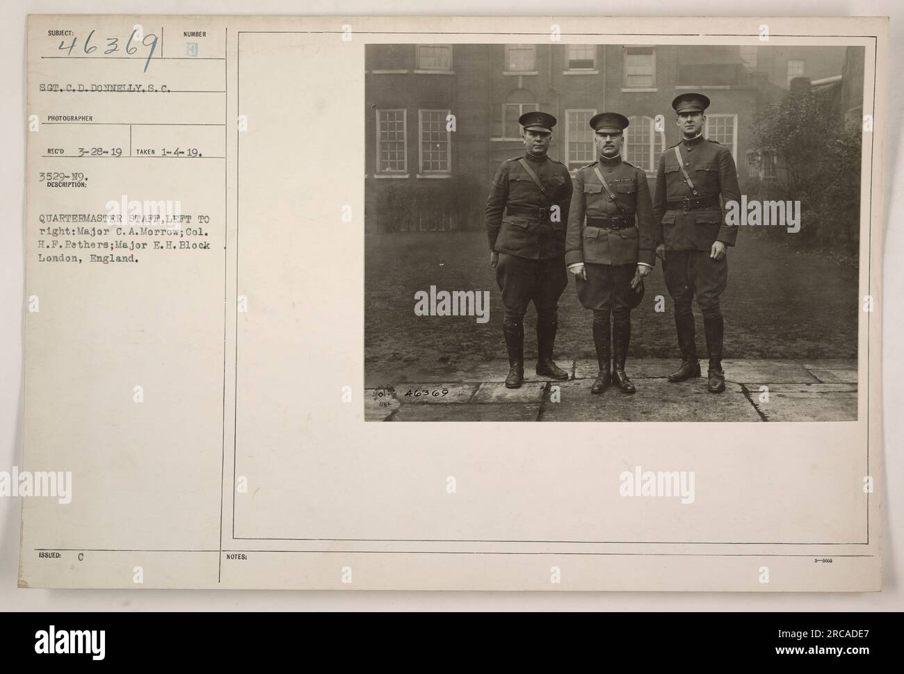 Quartermaster staff, left to right: Major C.A. Morrow; Col. H.F. Rethers; Major E.H. Block. London, England. This photograph was taken by 463691 SGT.C.D. DONNELLY.S.C. on January 4, 1919. It is identified as number 3529-19 in the collection. The caption on the back of the photo states the names of the staff members shown and their respective ranks. Stock Photo