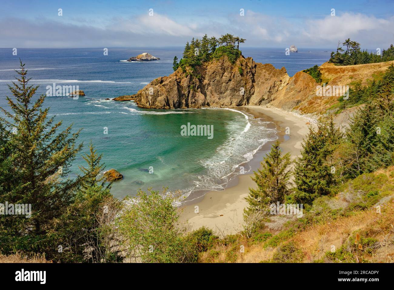 Rugged Oregon Coast on a Sunny Day | Arch Rock State Park, Brookings, Oregon, USA Stock Photo