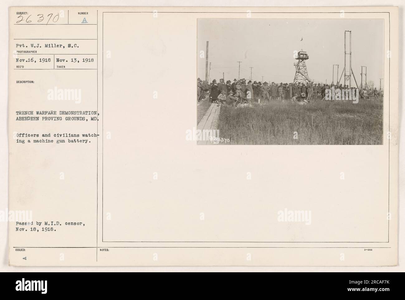 Officers and civilians observe a trench warfare demonstration at Aberdeen Proving Grounds