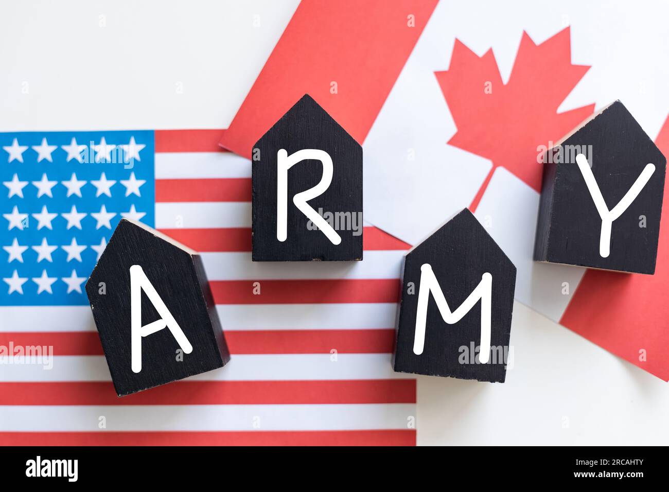 The abbreviation USA standing for the United States of America, spelt with wooden letter tiles
