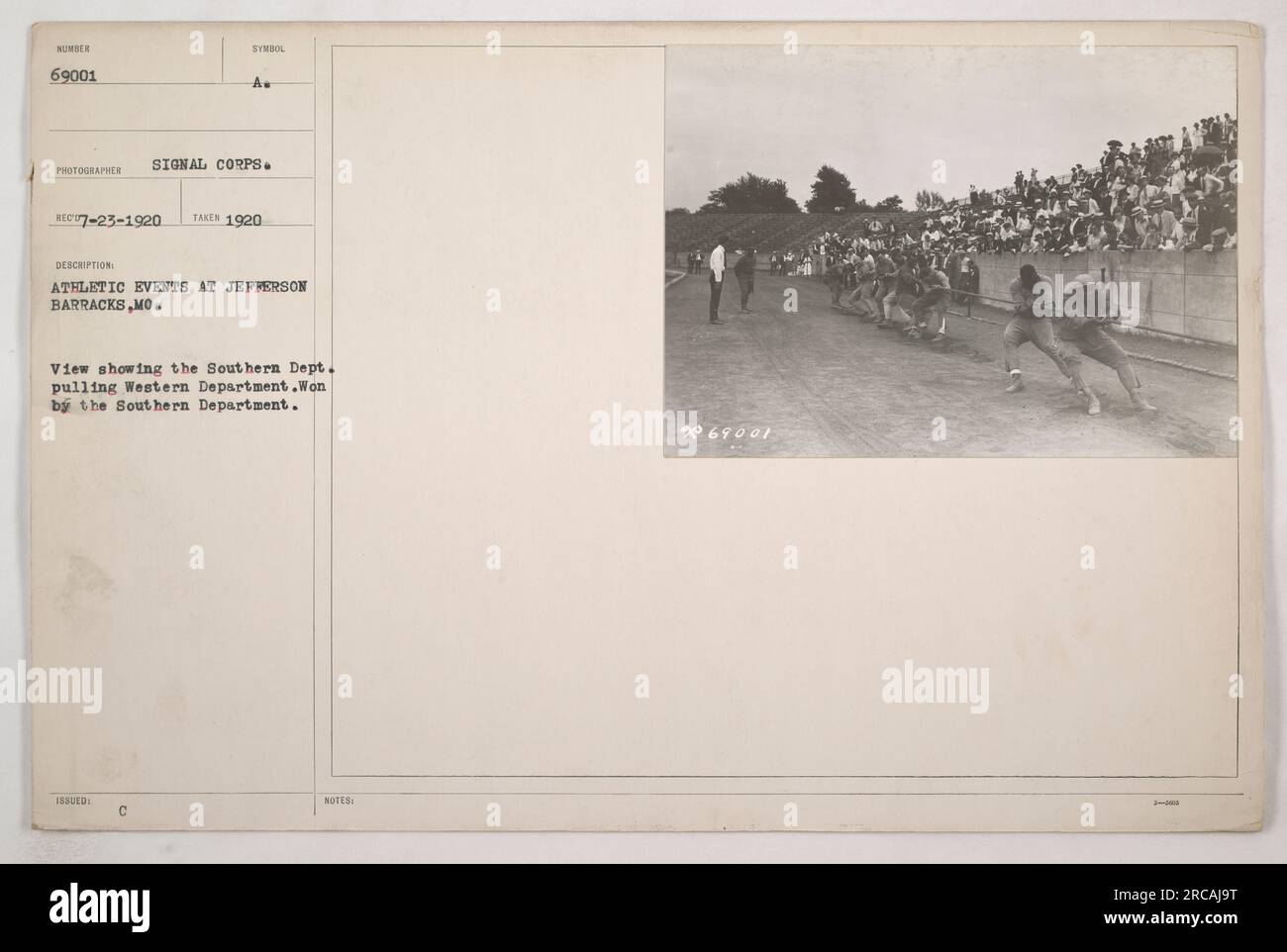 Soldiers at Jefferson Barracks in Missouri participating in an athletic event, where the Southern Department successfully pulls the Western Department. This photograph was taken in 1920 by the Symbol Signal Corps and is a part of a collection of military activities during World War I. Stock Photo