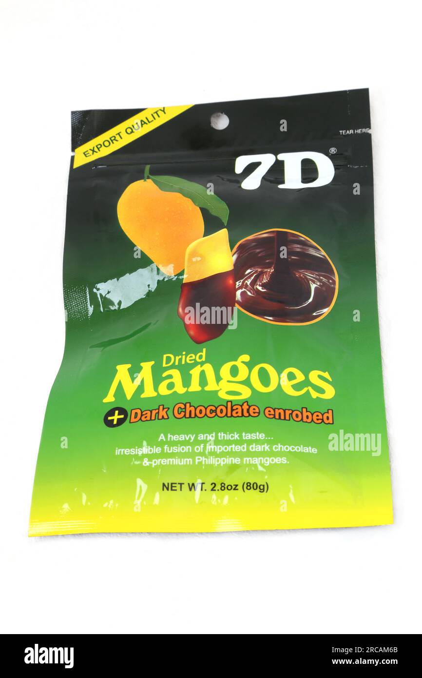 A Pack of Dried Mangoes Dipped in Chocolate Stock Photo