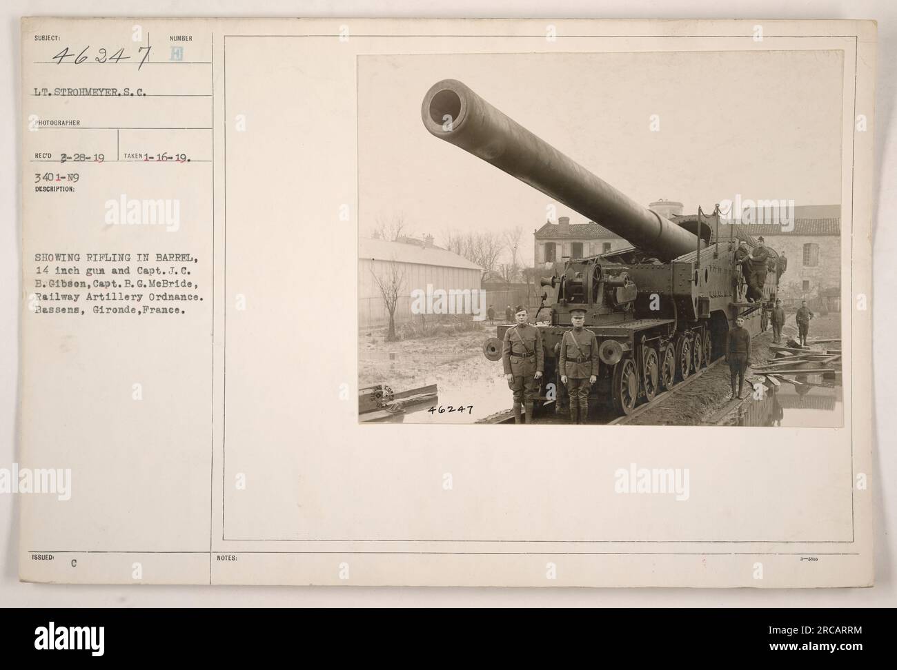 Caption: 'Image depicts the rifling in the barrel of a 14 inch gun, along with Capt. J.C.B. Gibson and Capt. G.G. McBride from Railway Artillery Ordnance. The photograph was taken in Bassens, Gironde, France on January 16, 1919. This image is subject number 46347 and was received by photographer LT. Strohmeyer.S.C. on February 29, 1919. It is documented under reference number 3401-19 with corresponding notes referenced as C NOTES 46247.' Stock Photo
