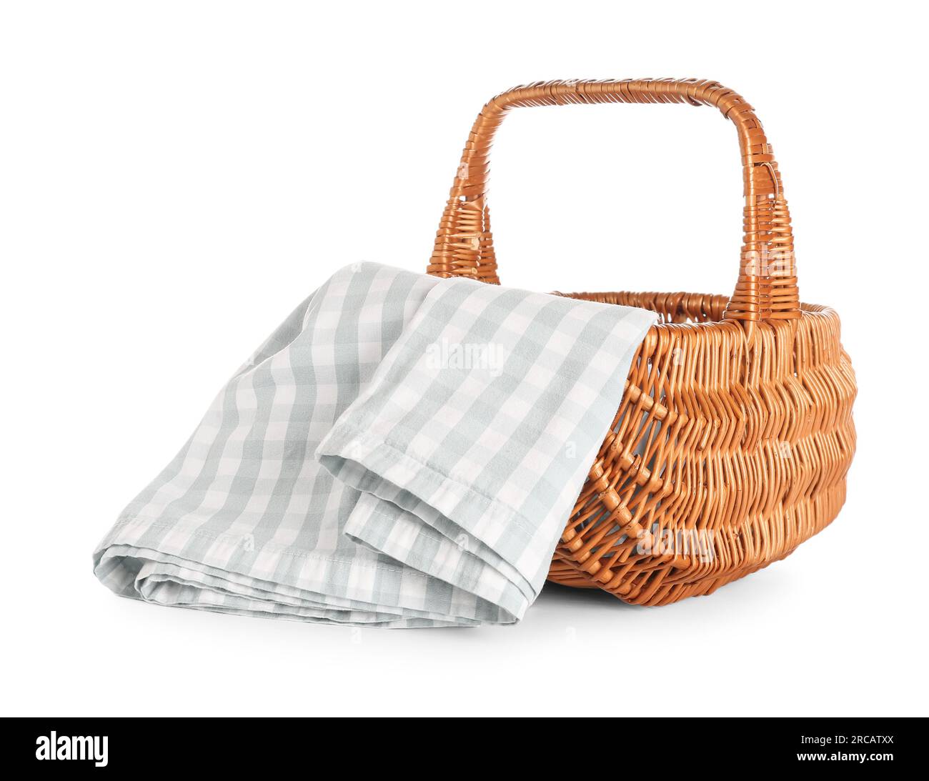 Wicker picnic basket with napkin on white background Stock Photo - Alamy