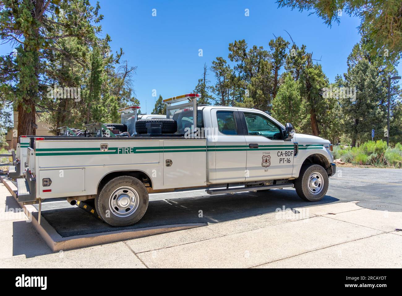 Big Bear Lake, CA, USA – July 8, 2023: A United States forest fire service pickup truck parked in the San Bernardino National Forest in California. Stock Photo
