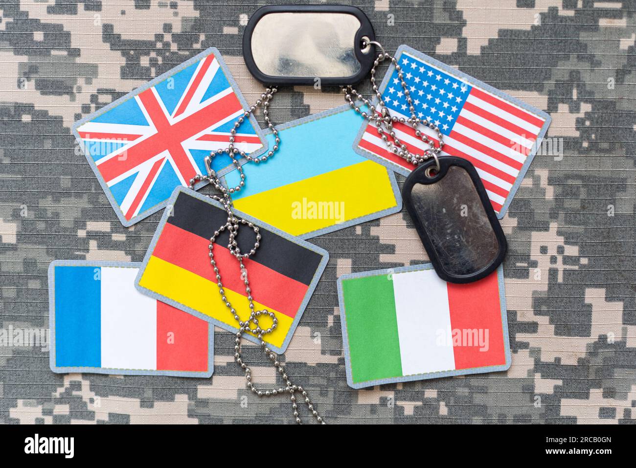 US and China flags on military uniform background for trade war concept ...