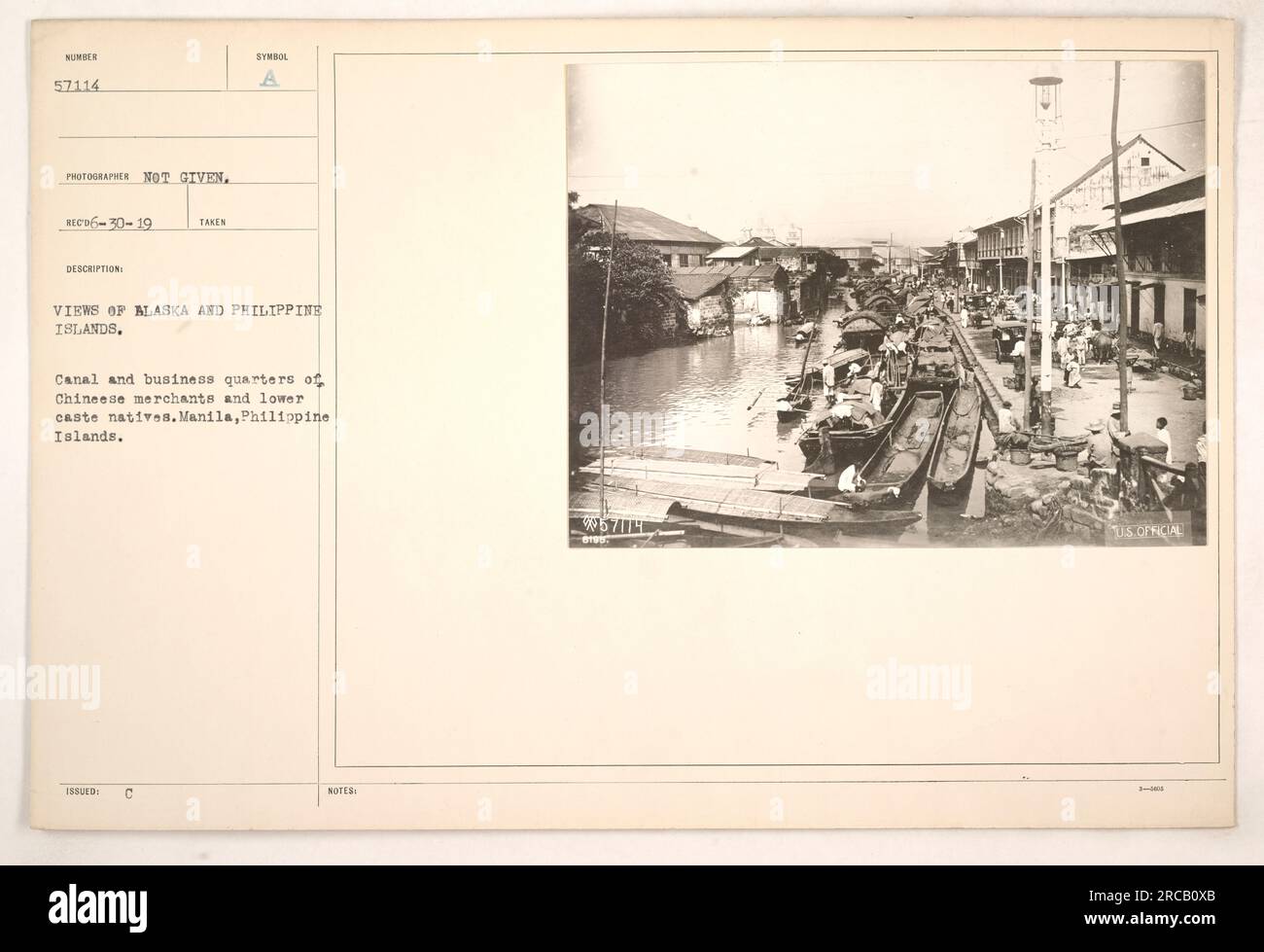 View of canal and business quarters in Manila, Philippine Islands, highlighting Chinese merchant establishments and the living areas of lower caste natives. This photograph is part of a collection showcasing military activities during World War I in Alaska and the Philippine Islands, but the photographer's identity is unknown. Stock Photo